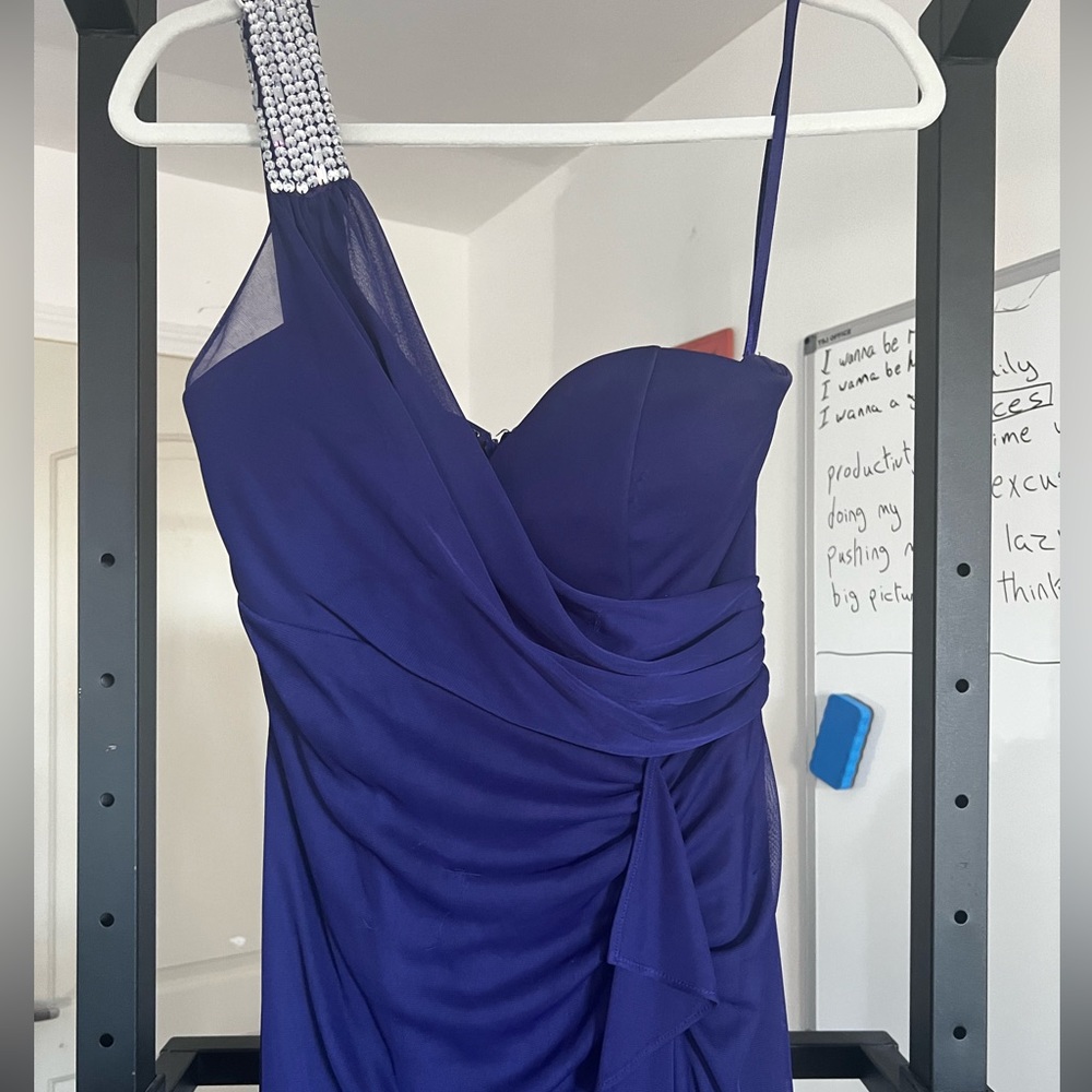 One shoulder with diamond strap wears for one time only